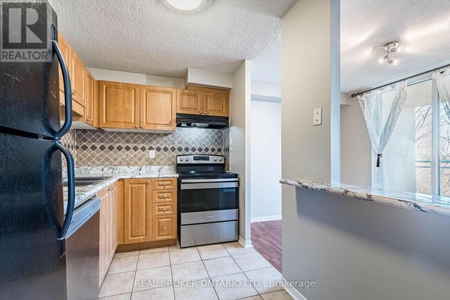 Photo - 2900 Battleford Rd Unité 412