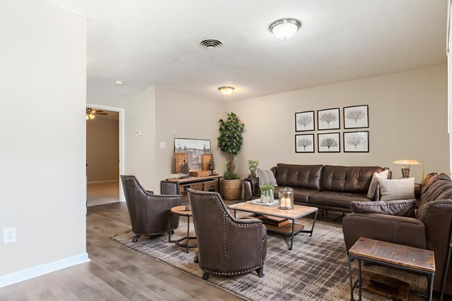 Welcome to Guest House, where modern elegance meets comfort. Enjoy our inviting lounge area, perfect for relaxation and social gatherings. Take the next step in finding your ideal home - schedule a tour today!
