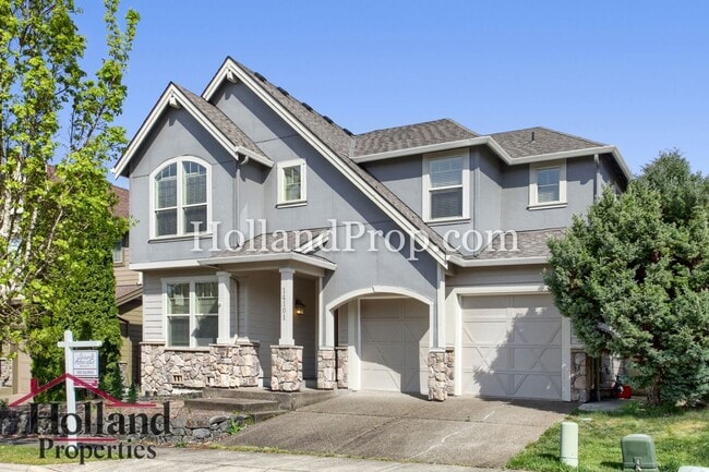 Photo - Spacious 4-Bedroom Portland Home with Fenced Yard, Fireplace & Modern Finishes!
