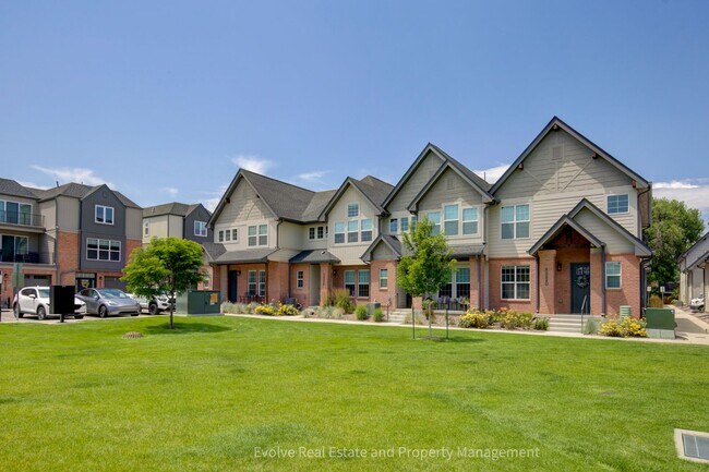 Photo - Evolve Real Estate: Discover Your Ideal Townhome With 4 Beds/4 Baths and Two-Car Attached Garage ...