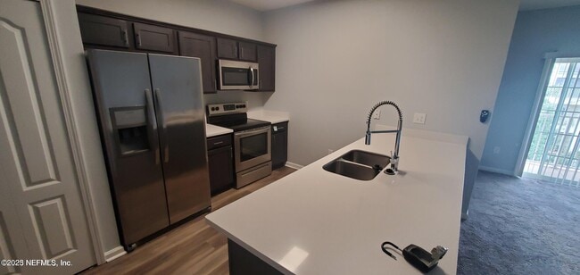 Building Photo - 4959 Key Lime Dr Unit 303 Rental
