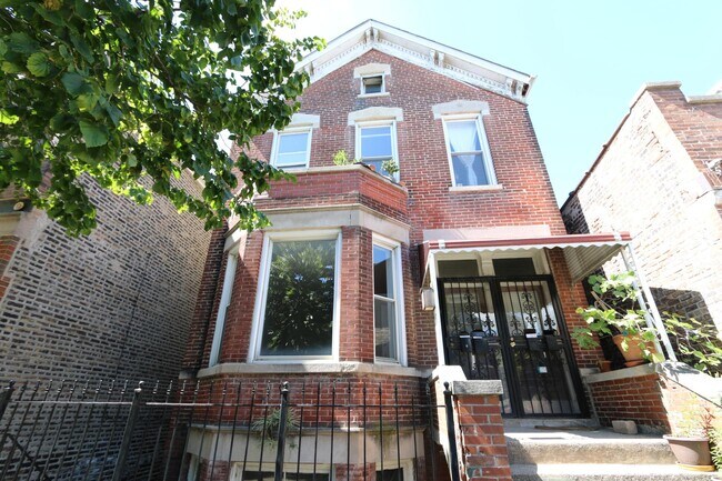 Building Photo - 2440 S Oakley Ave Unit 1