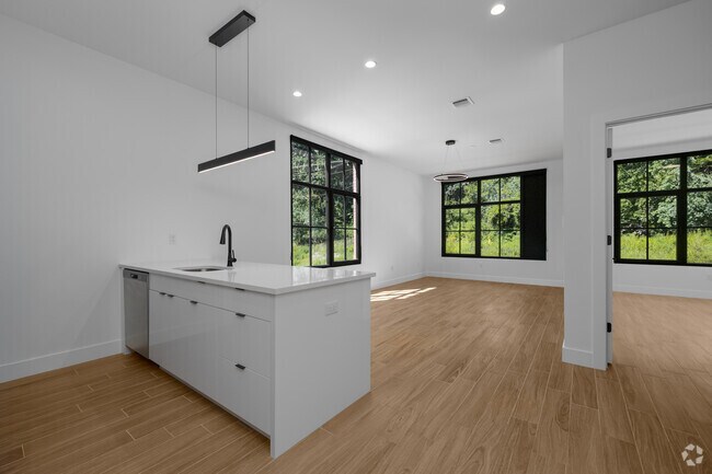1BR, 1BA - 840SF - Kitchen and Living Room