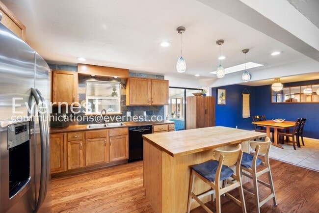Photo - 4-Bed/2-Bath House Charming Home with Fenced Yard/ Available Now!