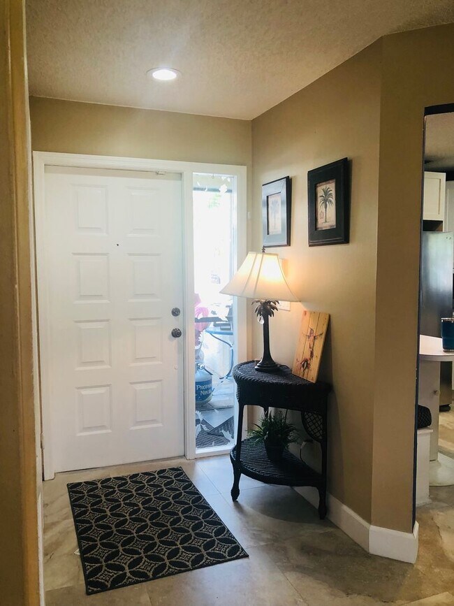 Photo - Experience the Gated Waterfront Community,...