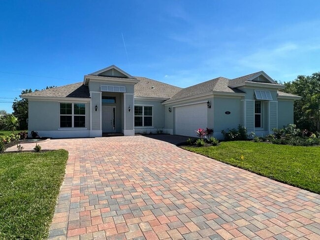 Building Photo - This Charming Brand-New Home is a 4/3 with...