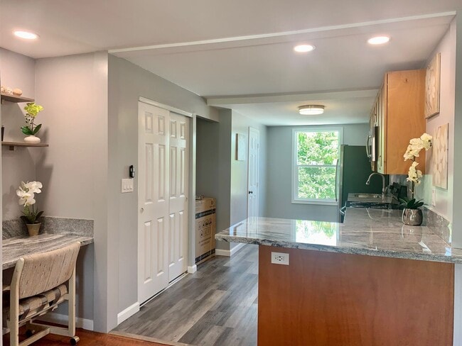 Photo - Spacious upstairs unit. Large Living area. Parking Available