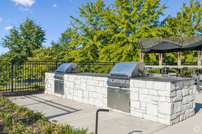 Outdoor Kitchen Lounge Area with Grilling Stations
