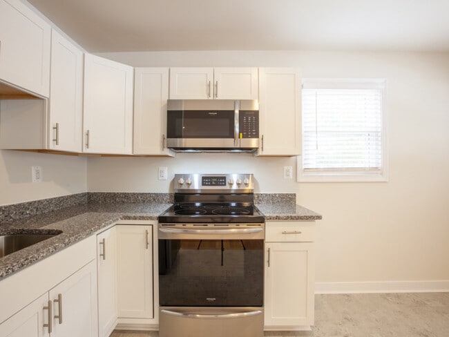 Smooth top range with microwave above - 612 Rock Creek Road Unit B