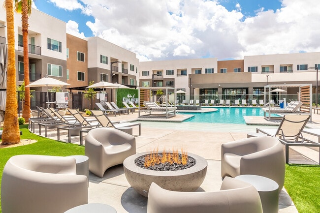 Relax at night by the poolside firepit