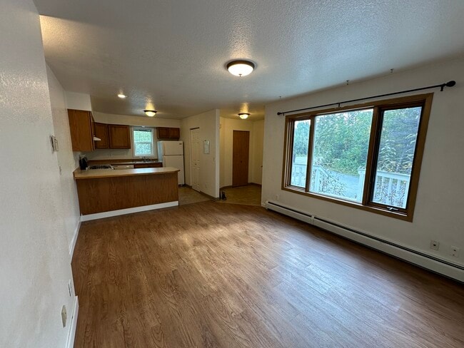 Building Photo - 1180 N Elsinore Ave Unit 2