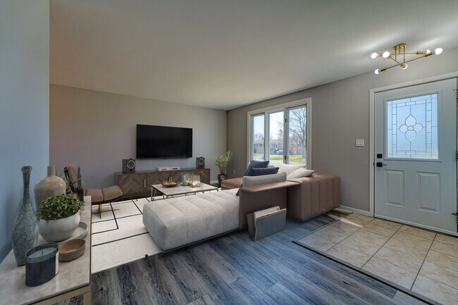 Photo - Bright & Spacious 3 Bedroom Main Floor Uni... Unit 1