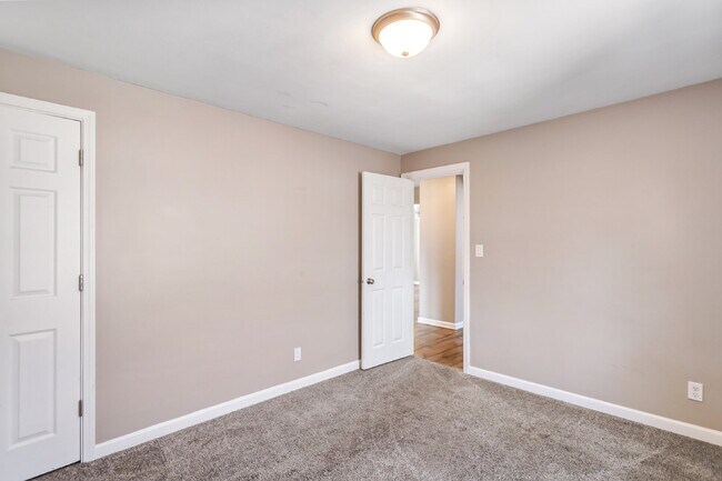 This spacious upper unit features 2 comfortable bedrooms with carpeting