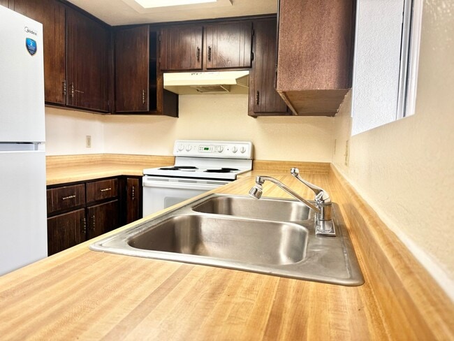 Photo - Two story unit move-in ready