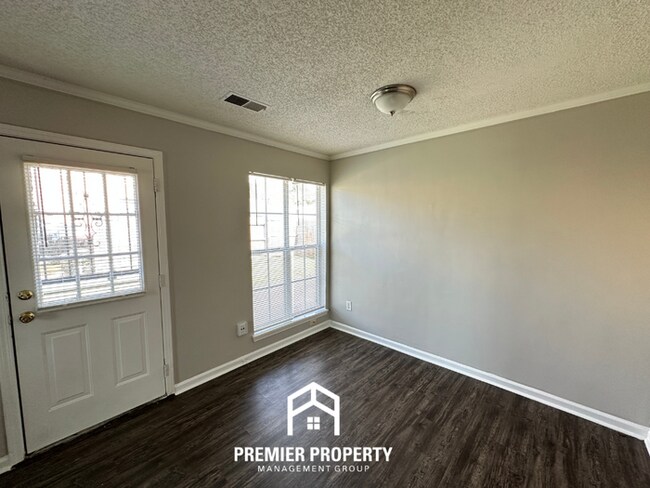 Photo - Charming 3BR/2BA Near Southwind | High Vaulted Ceilings, Hardwood Floors & Fireplace