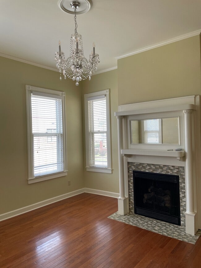 Living room gas fireplace - 1410 S Gaines St Unit C