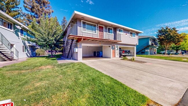 Photo - 2 story 2 bedroom 1 bath condo with covered parking, private storage and community pool!