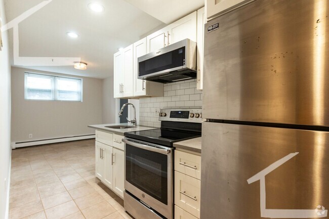 Building Photo - 1 bedroom Allston garden level apartment a...