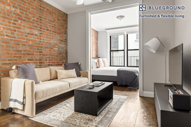 Building Photo - 209 E 25th St Rental