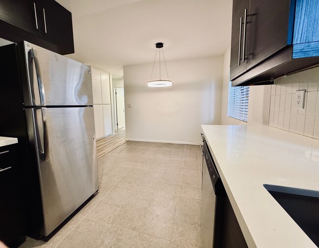 Kitchen reverse angle - 177 Douglas St Unit #1