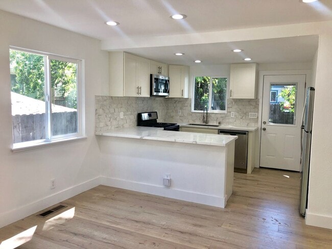 Photo - 3BD Townhome in Windsor | Private Yard + Garage | Walk to Shops + Wine Country