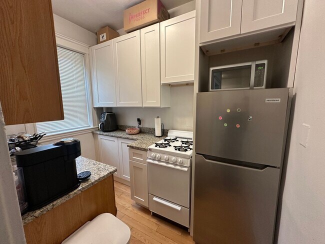 Photo - Close to Whole Foods - T Stop - Large Living Room - Natural Sun Light Unit 11