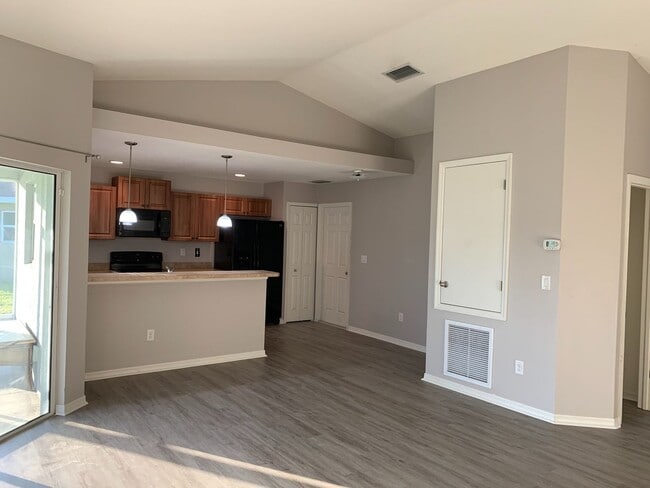 Photo - Well maintained 3/2/2 with pond view and community pool