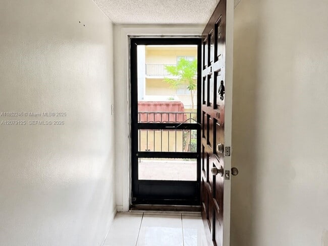 Building Photo - 3360 Spanish Moss Terrace Unit 204