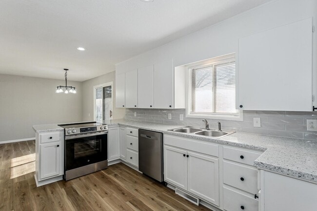 Photo - Beautifully Remodeled 4-Bedroom Home with 4+ Car Garage!