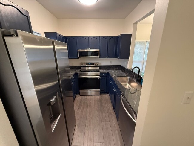 Photo - Beautiful End-unit townhome in university with Primary bedroom on 1st floor