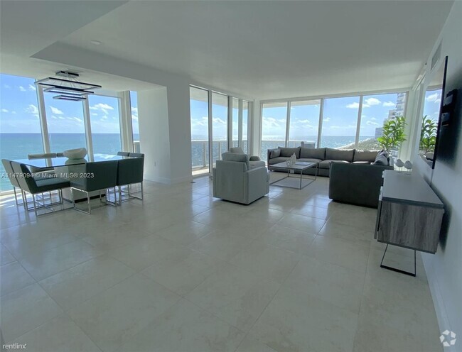 Building Photo - 2 br, 2.5 bath Condo - 10275 Collins Ave A... Unit Apt 1210