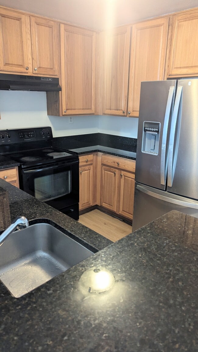 Kitchen with Lots of Cabinets - 9901 Boysenberry Way Unit 237