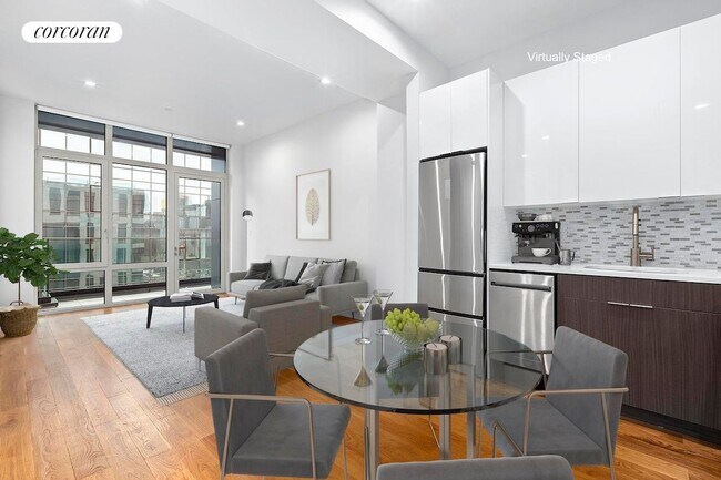 Building Photo - 21-59 44th Drive 2C