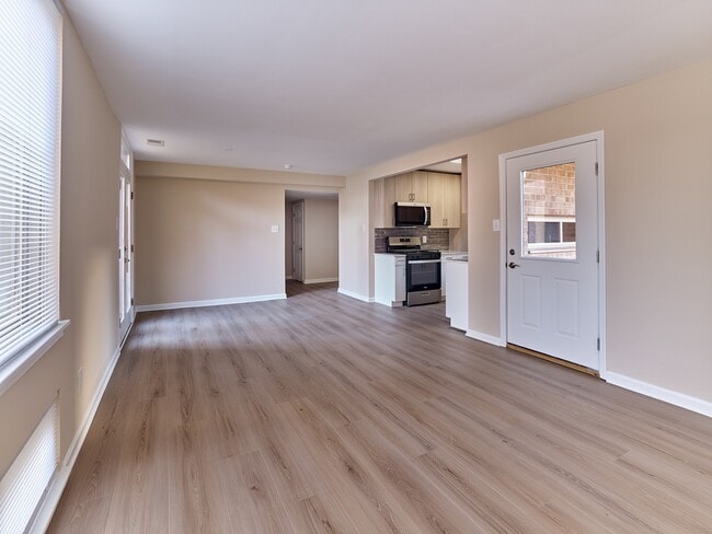 Bright, open 2 Bed | 1.5 Bath with 989 sq. ft., updated kitchen, and beautiful wood-style flooring throughout.