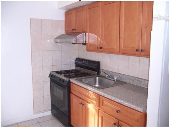 Photo - 66-15 Wetherole St Unit D16