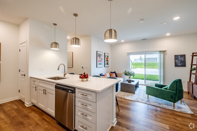 2BR, 2BA - 1,050SF - Kitchen and Dining Area