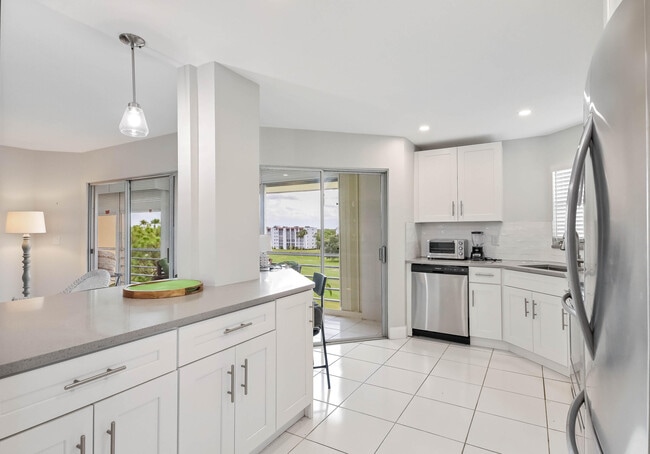 Building Photo - 3661 Via Poinciana Unit 616