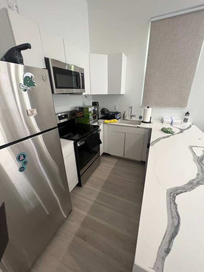 Photo - New Renovated 5bd/2ba Near Campus with Sha...