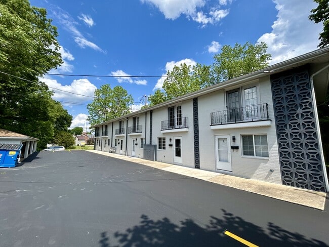 Newly Painted Building With Outdoor Updates, And Freshly Sealcoated Parking Lot - The Residences at 440 - FIRST MONTH FREE