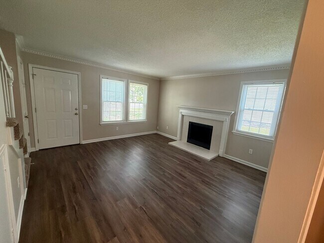 Photo - Beautiful 2BR Townhome | Huge Private Deck | Lawn Care Included | $1,695/mo