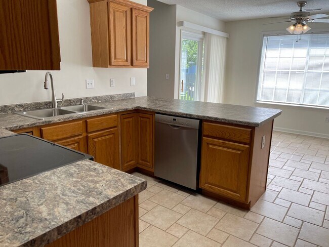 Building Photo - Spacious 4BR Home in Seven Oaks with Garage & Private Yard