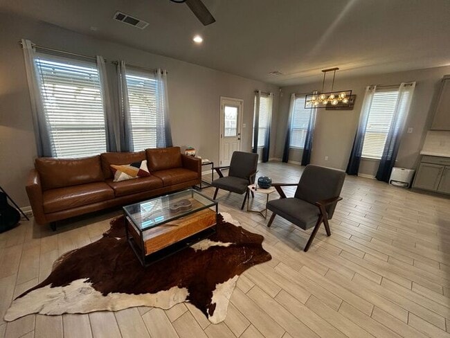 Photo - 3BR/2BA single-family home with fenced yard and attached garage in Jarrell, TX.