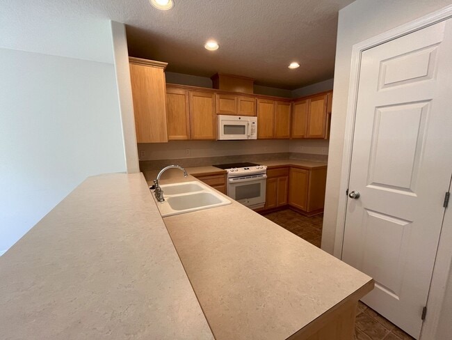 Photo - Welcome to this charming 3-bedroom, 3-bathroom home in Forest Grove!