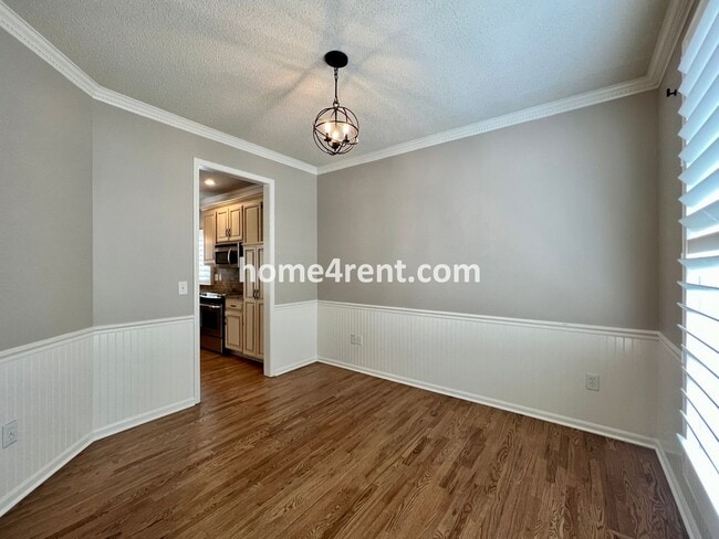 Photo - Updated Kitchen, Large Two Tiered Deck, Finished Basement in Blue Valley Schools!