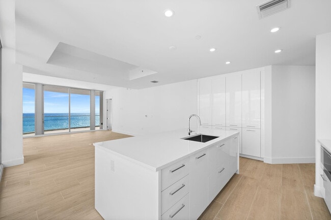 Building Photo - 153 N Seabreeze Blvd Unit 1005-S