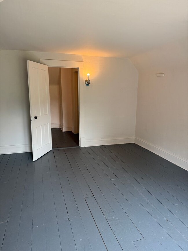 Photo - Welcome to the peace and quiet of this 4-bedroom 2-bathroom home.