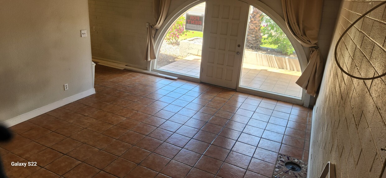 Living room looking out to Camelback Rd. - 4111 E Camelback Rd (Phoenix, AZ)