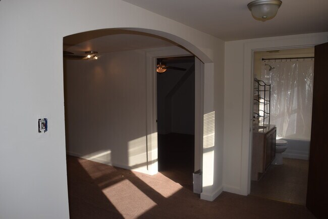 view of bathroom, bedroom and partial LR - 604 Main St Rear Apartments Unit A