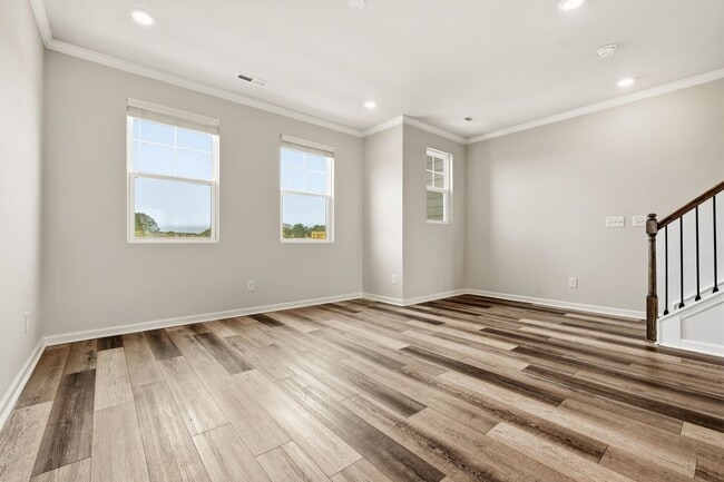 Photo - **Applications Pending** Light-Filled Townhome | Private Baths + Prime Raleigh Location