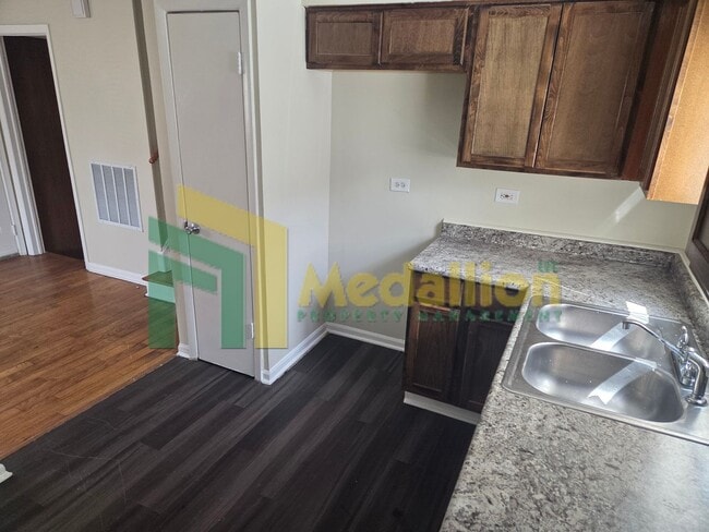 Photo - Updated 4-Bedroom Home with Finished Basement and Fenced Yard